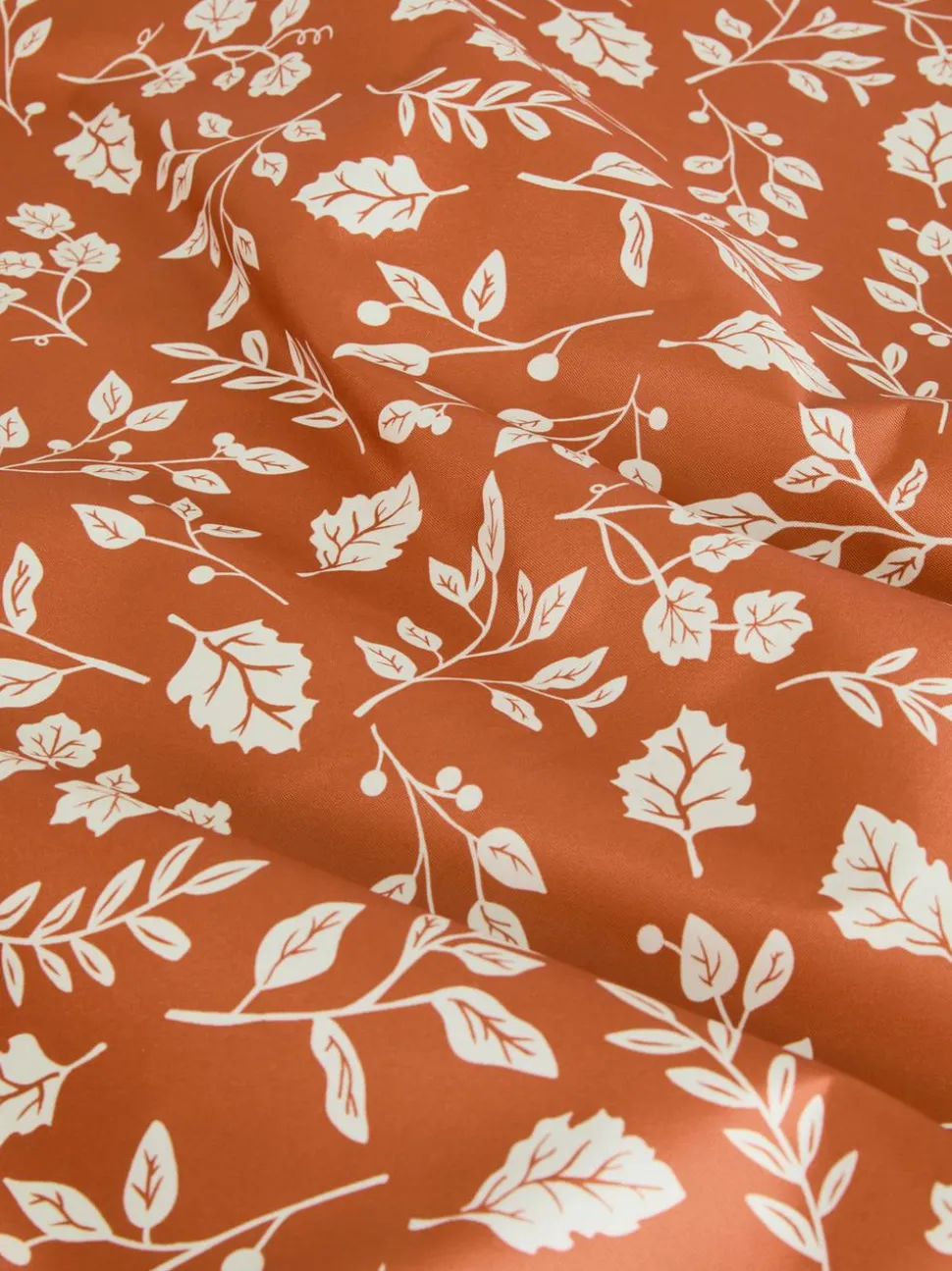 Abwischbare Tischdecke mit Blattmuster