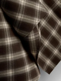 Asymmetrischer „By Coleen“ Midirock mit Karomuster
