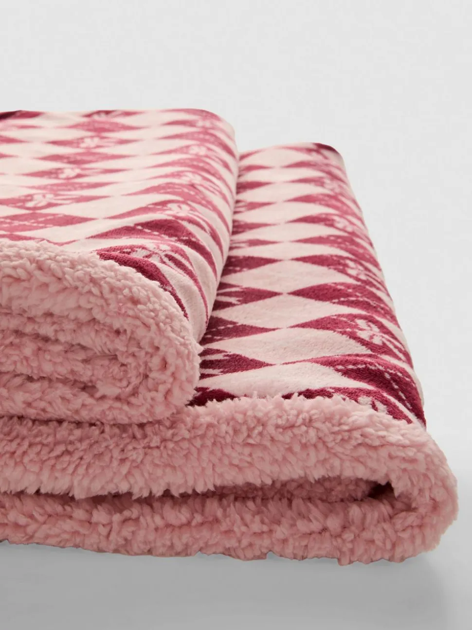 Überwurf mit Argyle-Schleifen-Design