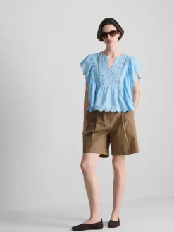 Besticktes Baumwolltop mit Bogenkante
