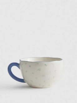 Cappuccinotasse mit Blumenmuster