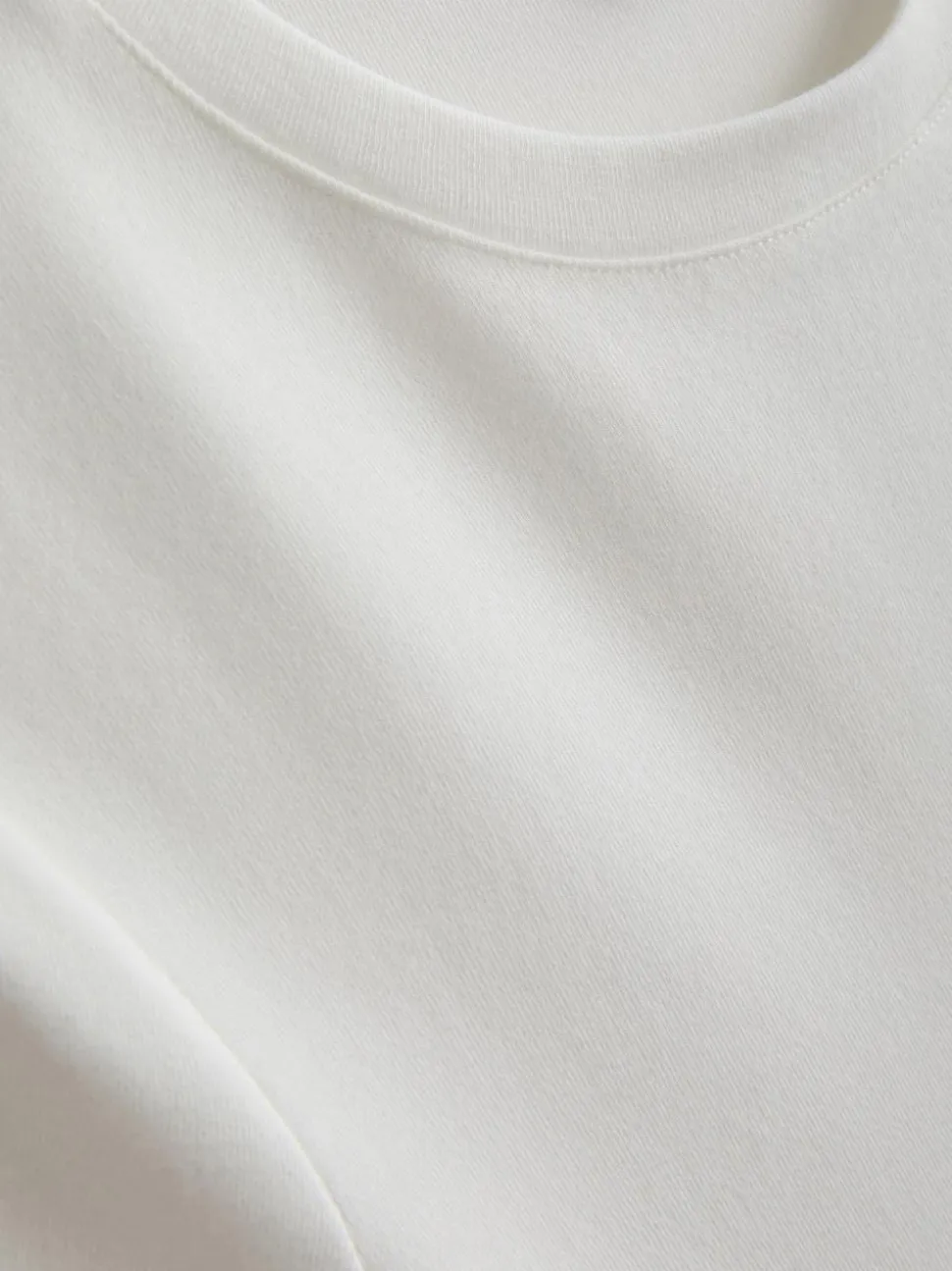 Eng anliegendes „By Coleen“ T-Shirt