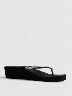 Flipflops mit Keilabsatz und Strasssteinen