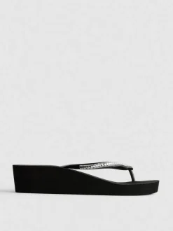 Flipflops mit Keilabsatz und Strasssteinen