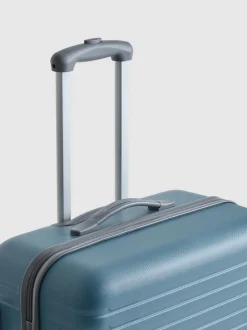 Geriffelter Hartschalenkoffer mit vier Rollen