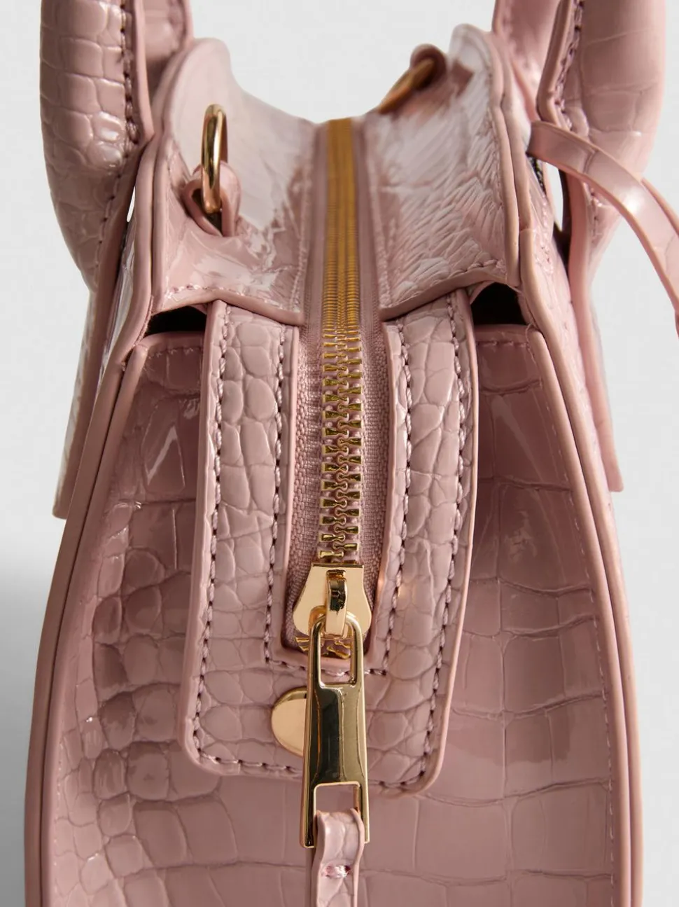 Handtasche in Kroko-Optik