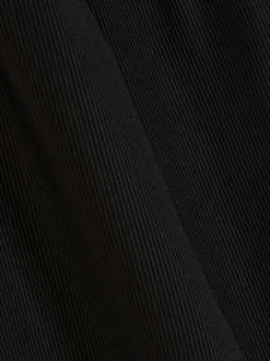 7–15 Jahre | Gerippte Leggings mit ausgestelltem Bein