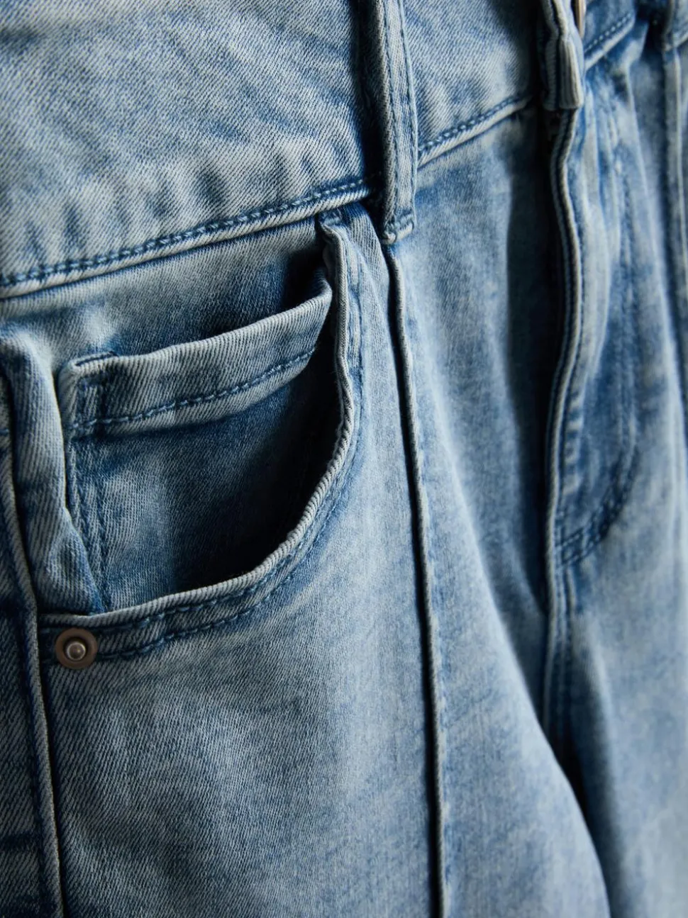 7–15 Jahre | Jeans mit ausgestelltem Bein und Biesen