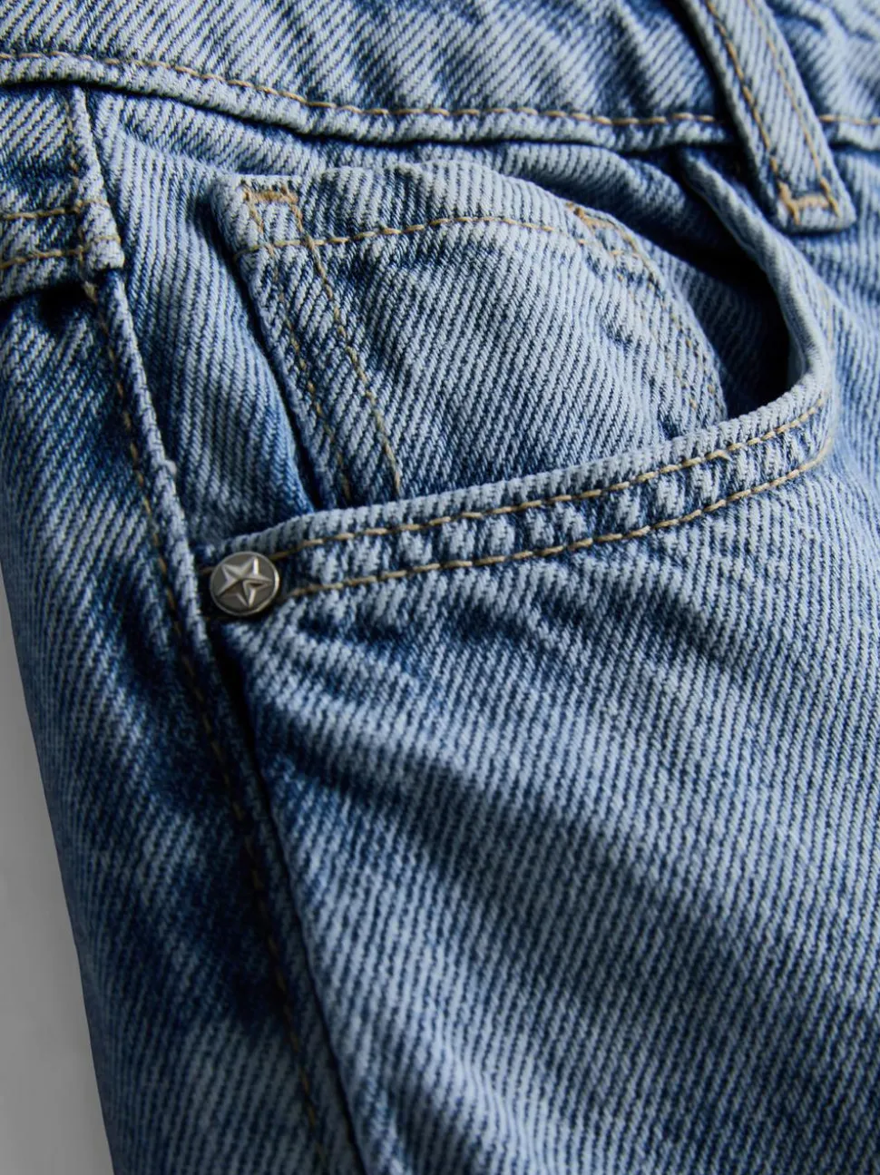 7–15 Jahre | Jeans mit weitem Bein und Blumenstickerei