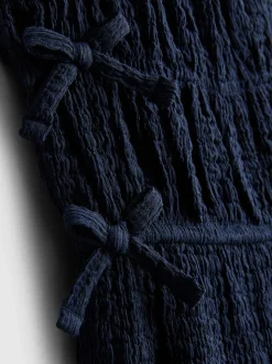 1,5–9 Jahre | Jumpsuit mit Schleife