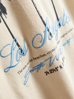 7–15 Jahre | Strukturiertes T-Shirt mit Palmen-Grafik
