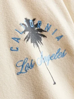 7–15 Jahre | Strukturiertes T-Shirt mit Palmen-Grafik