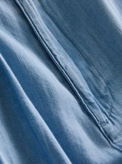 Jeans aus Baumwoll-Denim mit weitem Bein und Bundfalten