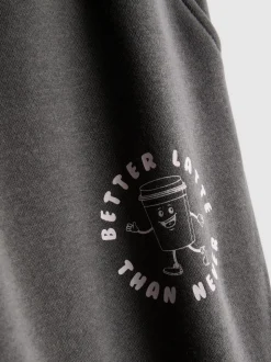 Jogginghose aus Baumwollmischung mit Bündchen und Print