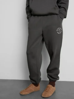 Jogginghose aus Baumwollmischung mit Bündchen und Print
