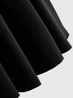 Krepp-Top mit Herzausschnitt und Schößchen