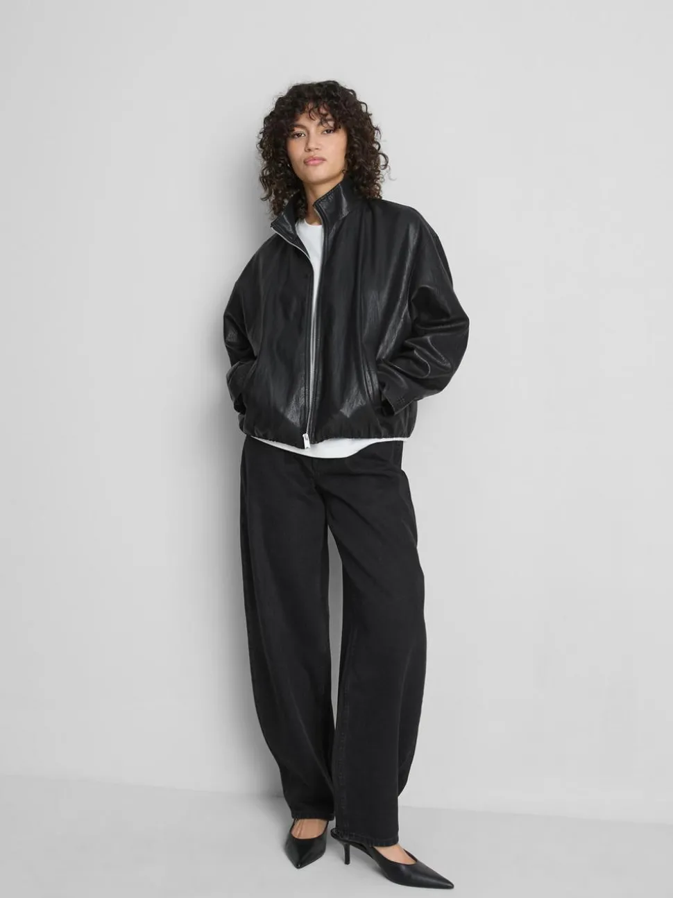 Kunstlederjacke mit Trichterkragen