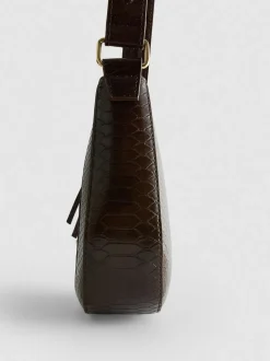 Kunstleder-Schultertasche mit Trensenschnalle