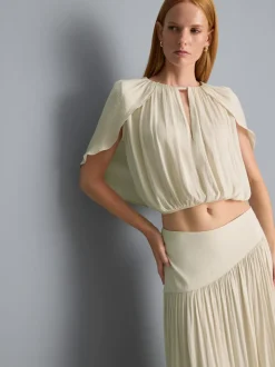 Kurze Cape-Bluse mit Drapierung