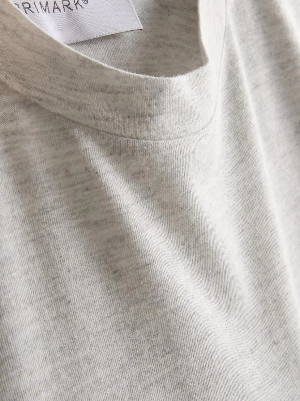 Langes T-Shirt mit aufgesetzter Tasche