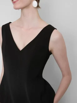 Lila Top mit V-Ausschnitt und Schößchen