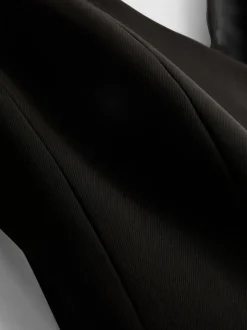 Lila Top mit V-Ausschnitt und Schößchen