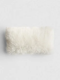 Längliches Kissen im Pompon-Stil