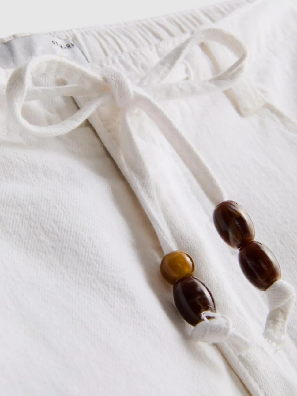 Lässige Baumwollshorts mit Kordelzug und Perlen