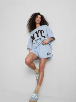 Lässige „NYC“ Shorts mit hohem Baumwollanteil