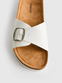 Mules mit Schnallenriemen
