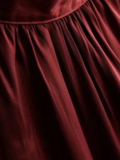 Neckholder-Bluse mit Ballonsaum