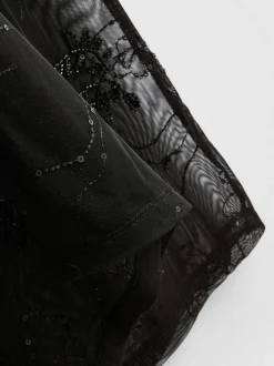 Perlenbesetzte „Paula Echevarría“ Netzstoffhose mit weitem Bein