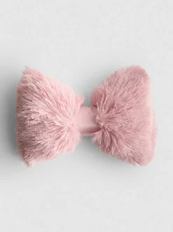 Schleifenförmiges Kissen im Pompon-Stil