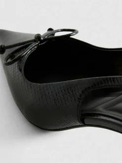 Slingback-Pumps mit Zierschleife