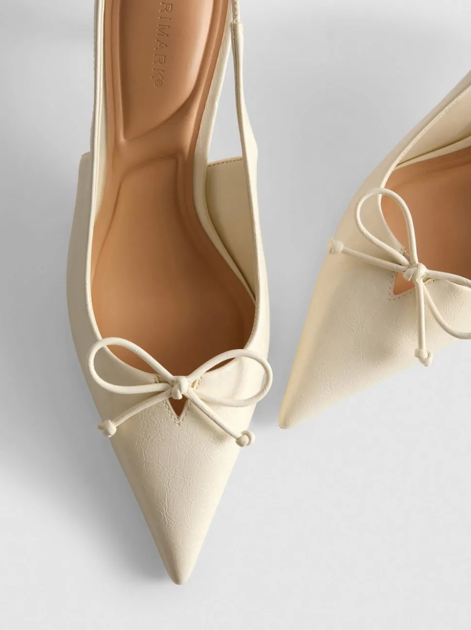 Slingback-Pumps mit Zierschleife