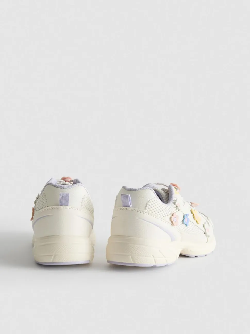 Sneaker mit dicker Sohle und Blumenmuster