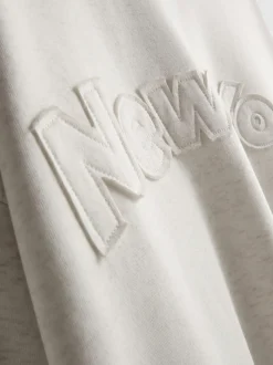 Sweatshirt mit hohem Baumwollanteil und Applikation