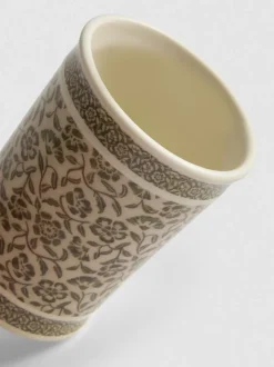 Zahnputzbecher mit Blumenmuster