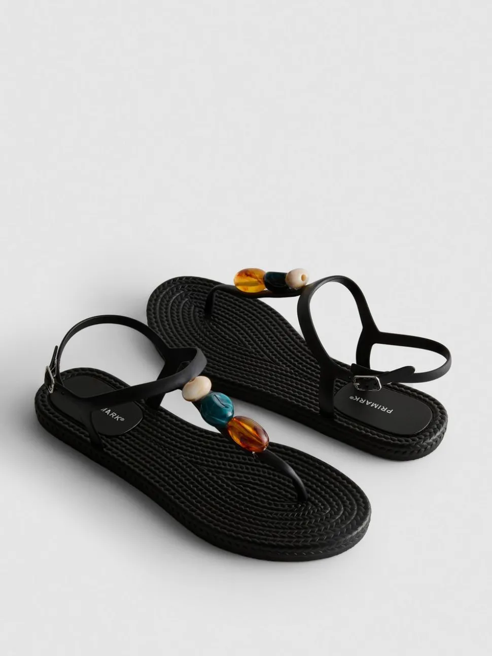 Zehenstegsandalen mit Perlen