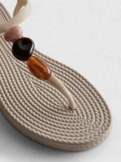 Zehenstegsandalen mit Perlen